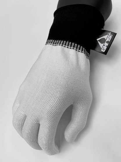 Close-up of the Ghost Wrap Glove, highlighting its slick material for drag-free movement.