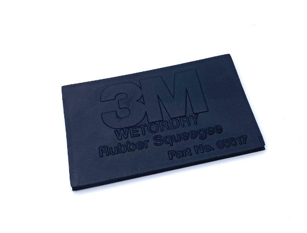 Close-up of the 3M Wet or Dry Squeegee, showcasing its soft rubber design for gentle yet effective application.
