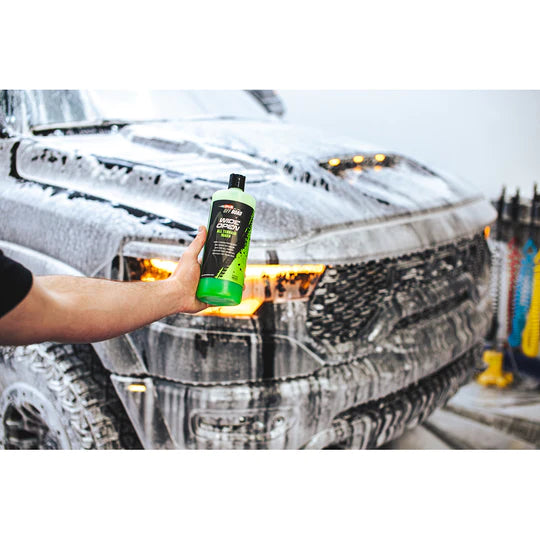 Truck detailing made easy with P&S Wide Open All Terrain Wash, showcasing its capability to tackle heavy dirt and grime.