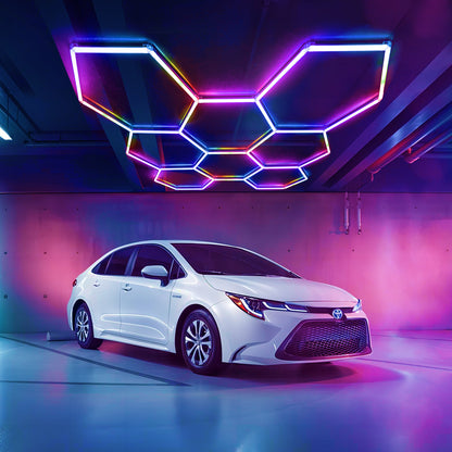 Colorix Hexa Garage Light RGB06 creating a dynamic and engaging atmosphere in a gaming setup with customizable RGB lighting.