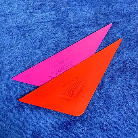 TRI-EDGE XL in pink and red, showcasing the best in tinting tool innovation.