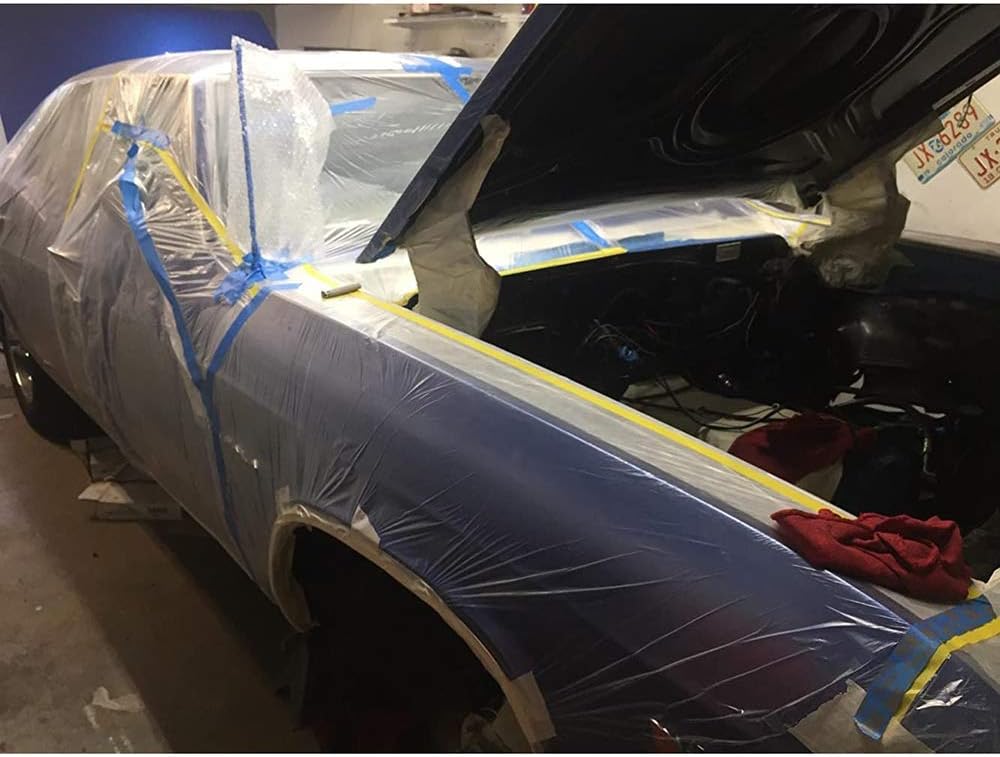 Door Panel Pre-Taped Masking Film in action on a car, illustrating its effective use in safeguarding door panels from water damage.