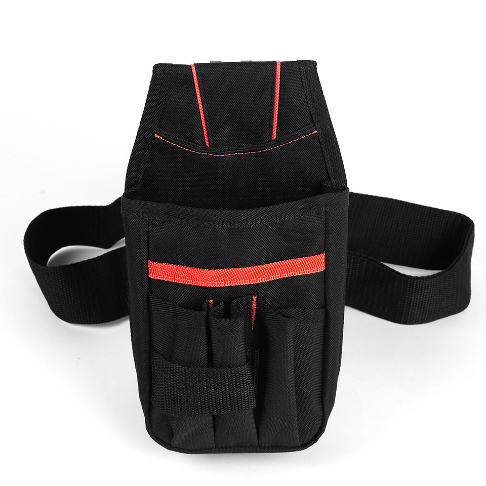ProStyle Tint & Wrap Utility Pouch Bag on a workbench, illustrating its easy accessibility and readiness for professional use.