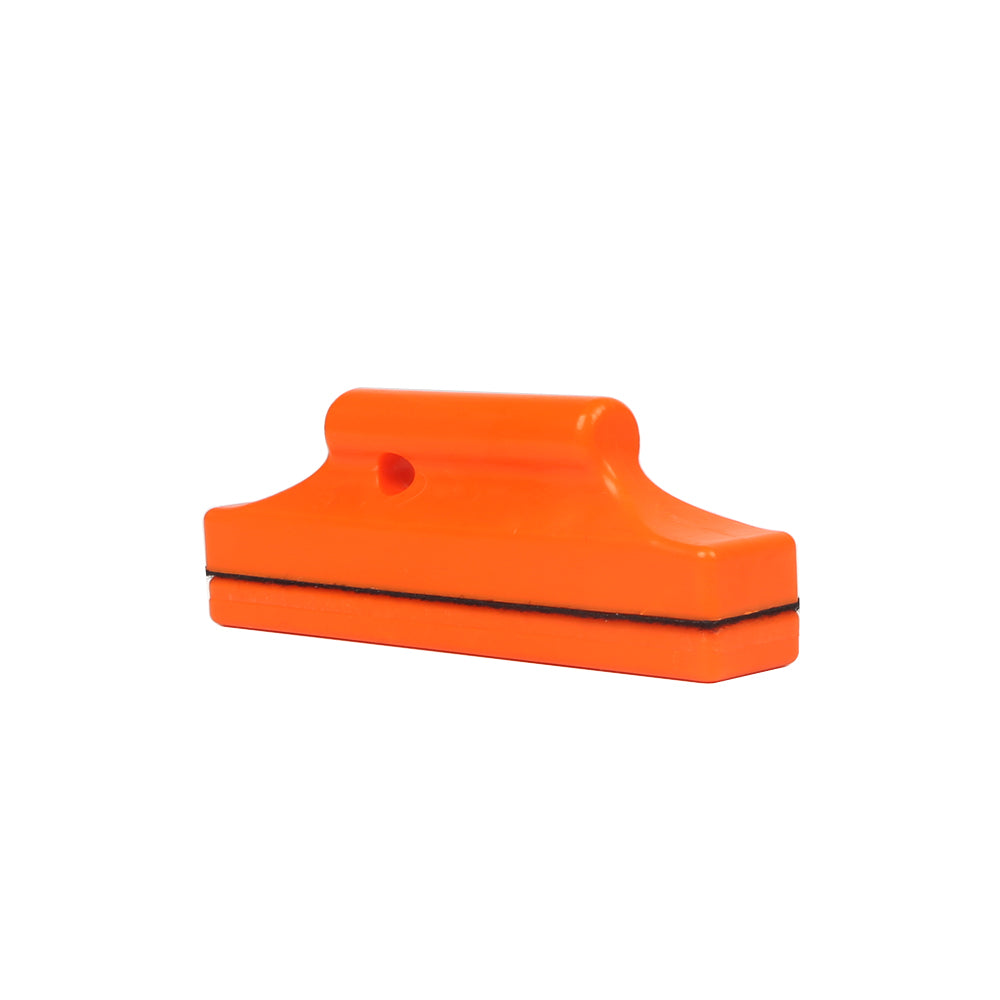 Rectangle Magnetic Holder for Vinyl Wrap & Decals in vibrant orange, demonstrating secure grip on a metal surface.