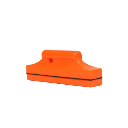 Rectangle Magnetic Holder for Vinyl Wrap & Decals in vibrant orange, demonstrating secure grip on a metal surface.