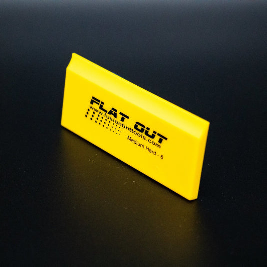 Close-up of the Fusion 5" Yellow Flat Out Squeegee Blade, highlighting its medium-hardness for precision tinting.