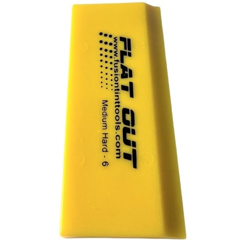 Fusion 5" Yellow Flat Out Blades, demonstrating the tool's popularity and reliability in professional tinting.
