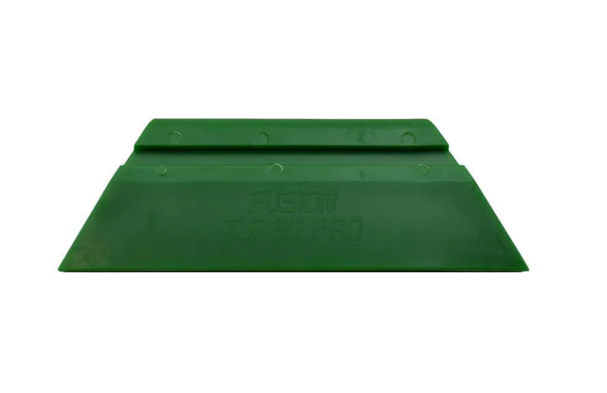 Green Fusion Turbo Pro Squeegee 5.5", demonstrating its precision application on soft-coated films.