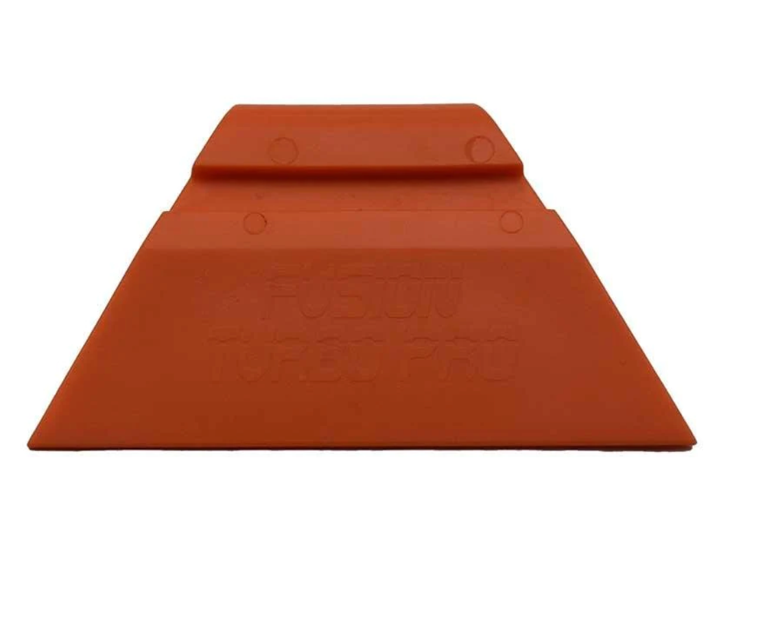 Orange Fusion Turbo Squeegee 3.5", demonstrating the tool's effectiveness in film smoothing
